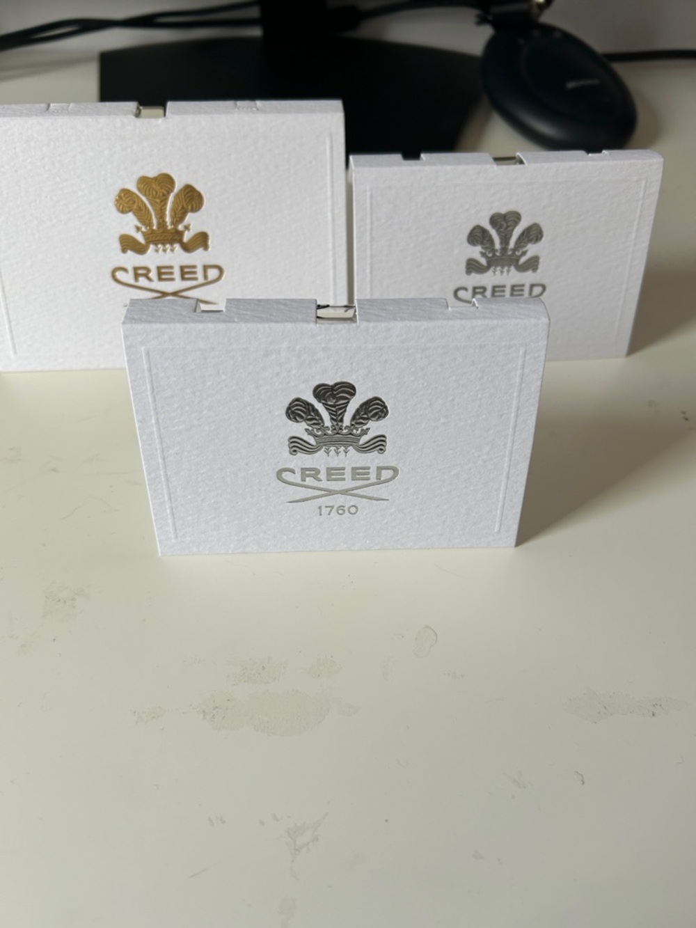 Creed White Sample Cards with Gold and Black Logos